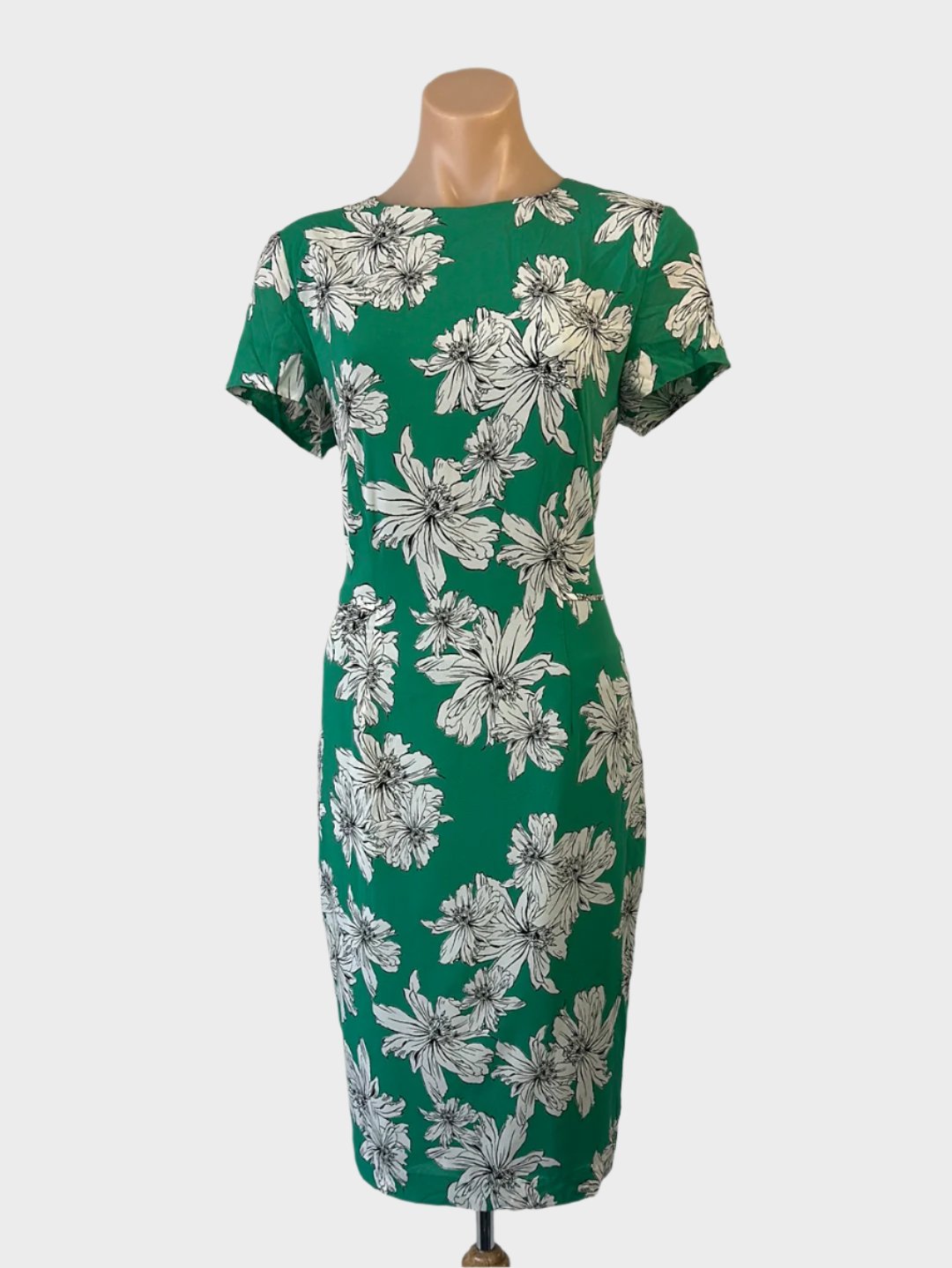 David Lawrence sheath dress in green and white crepe with floral print, cap sleeves, round neck, and straight skirt with back vent for office wear.