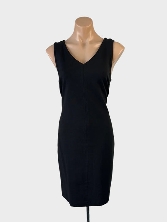 Talbots classic shift dress in black jersey with v-neck, topstitch centre seam, and straight skirt for office wear.