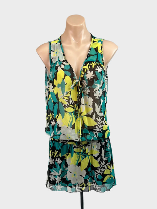 Designer Elisabetta Franchi green and black sleeveless drop waist dress in sheer crepe with floral print, keyhole neck, and shirred hip band for smart casual wear.