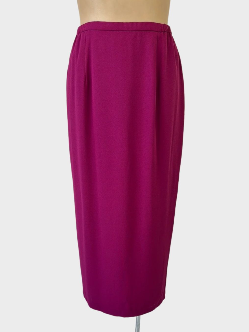 Maggie Shepherd classic straight skirt in dark pink crepe with narrow waistband, elasticated back, and back slit for office wear or special events.