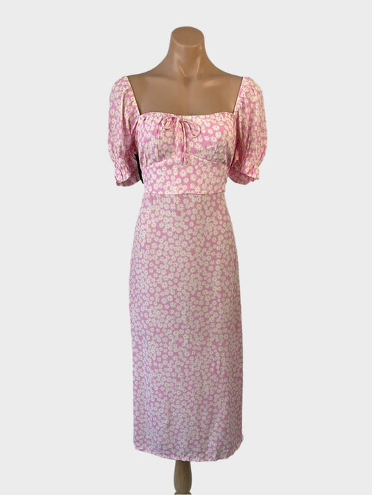 Faithful the Brand off-the-shoulder dress with pink pastel daisy print, puff sleeves, elasticated neck, and flared skirt for smart casual wear.