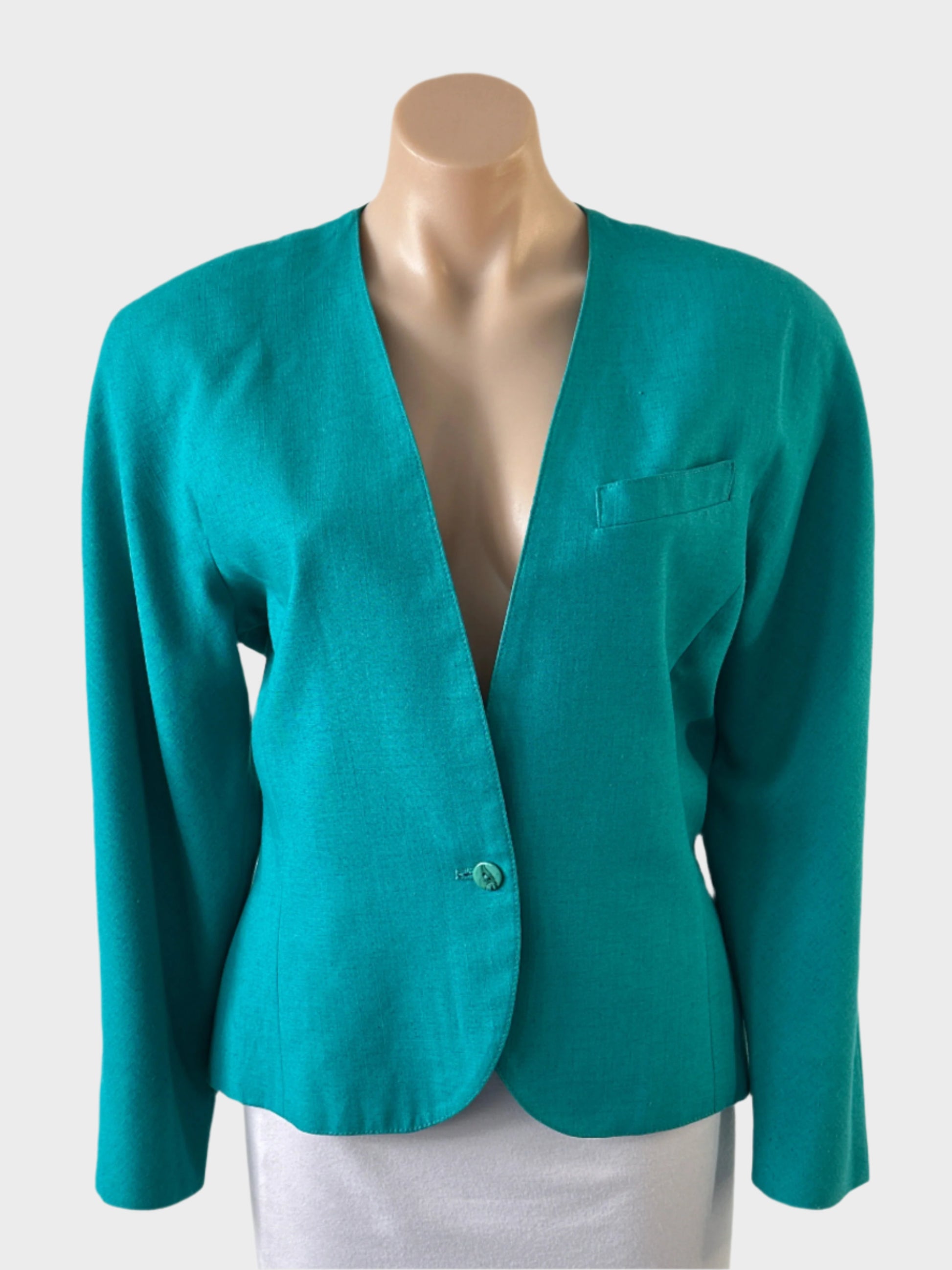 Fletcher Jones vintage 80's single-breasted cardigan jacket in teal slub weave, featuring one button closure and welt breast pocket for office or special events.