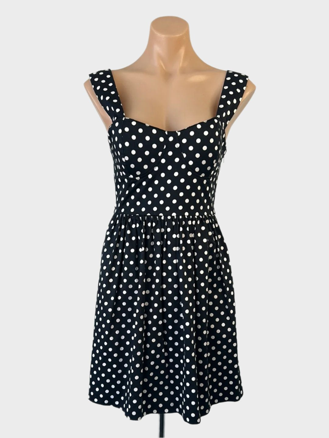 Forever New dress with black & white  polka dot print, corset-style top, sweetheart neck, and gathered skirt with pockets for smart casual wear.