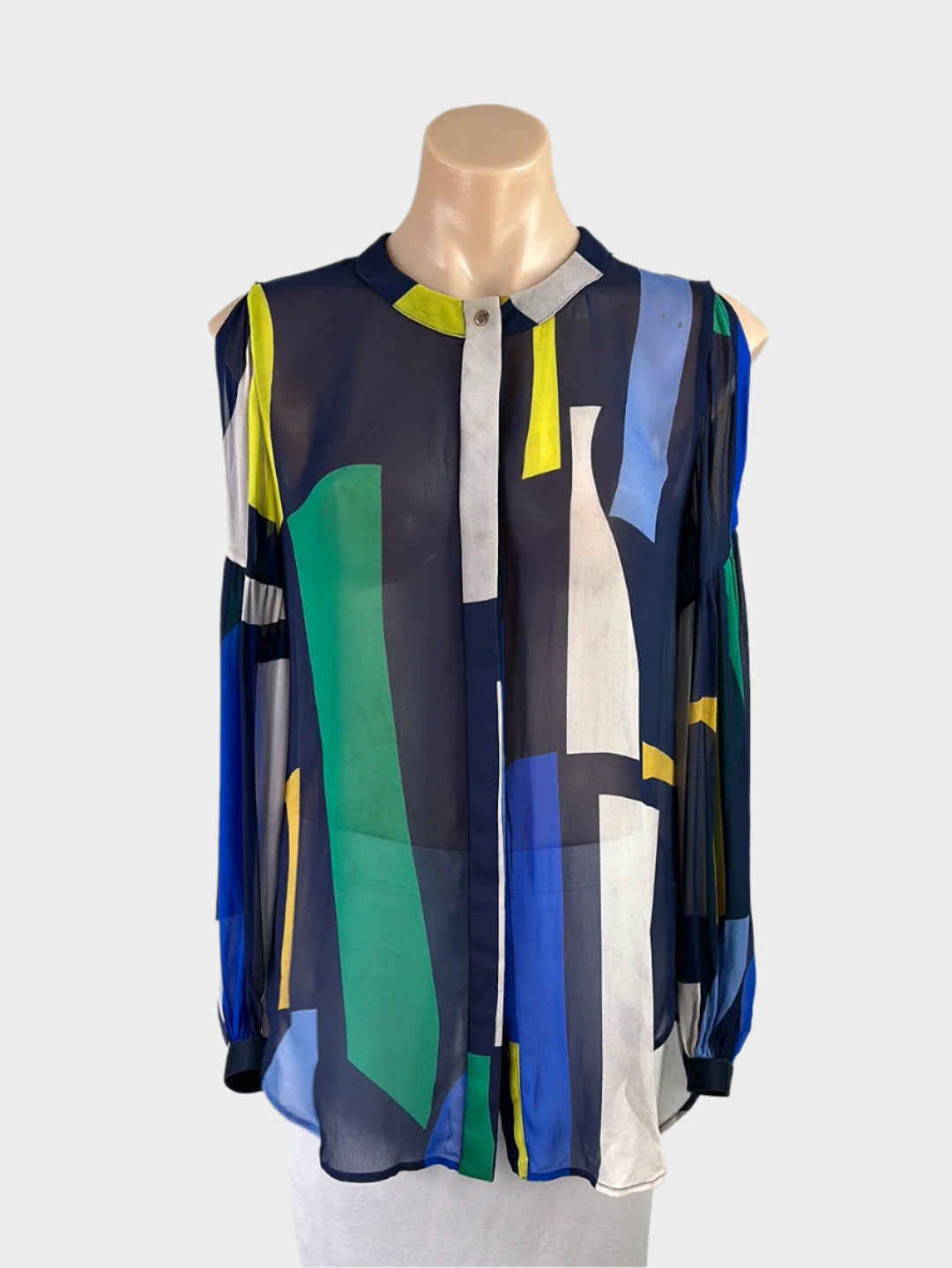 Designer Ginger & Smart cold shoulder shirt in sheer crepe with geometric print, button-up front, and curved hem for office or smart casual wear.