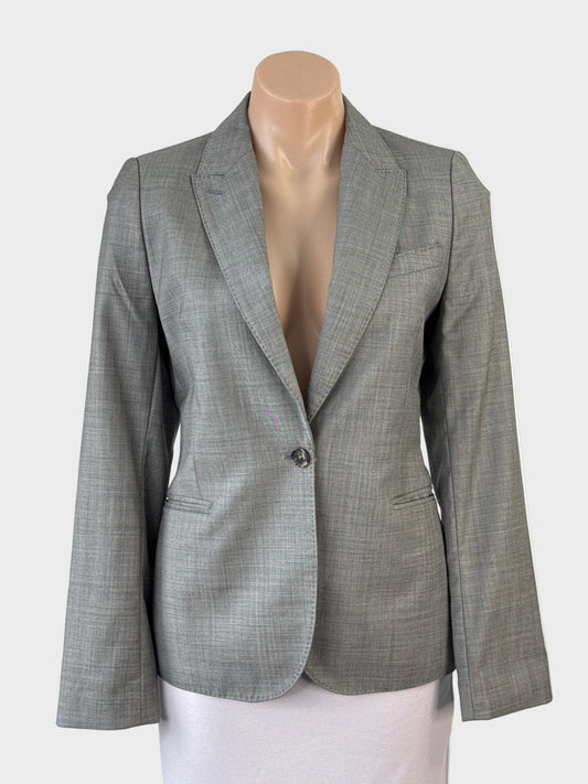 Designer Herringbone classic single breasted jacket in a pure grey wool, featuring a single button fastener, notched lapels, long sleeves with button cuffs for office wear.