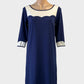 Designer Leona Edmiston navy shift dress with ivory yoke and scalloped edging for office wear.