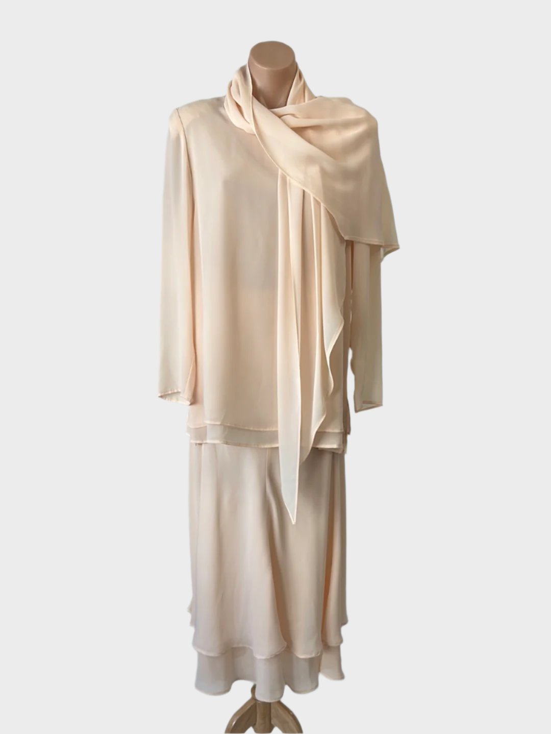 Designer Lizzie Collins classic skirt and top set with matching shawl in sheer layered crepe, long sleeves, and notched hem for special occcasion wear.