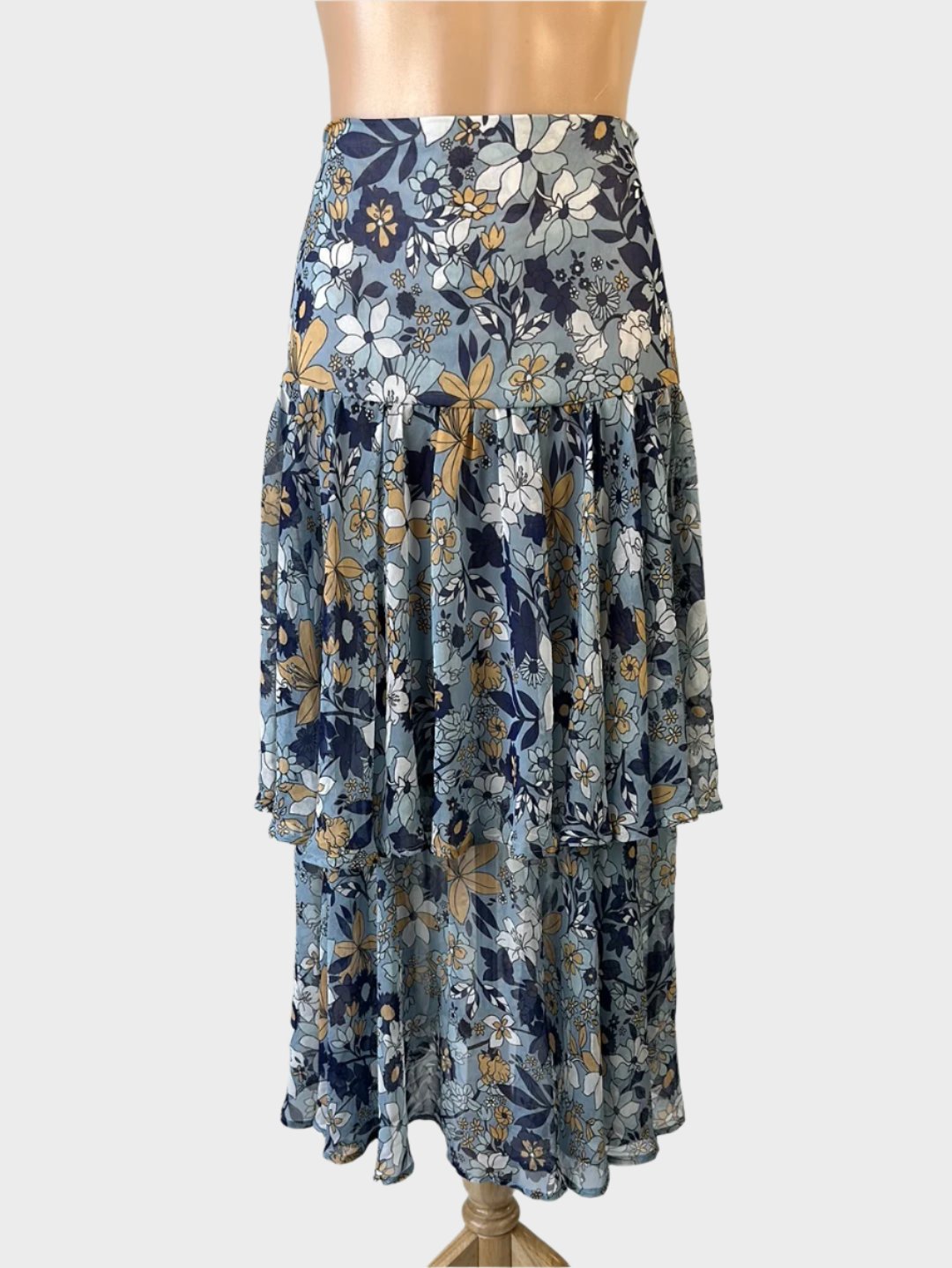 Ministry of Style layered skirt in sheer crepe with retro floral print in blue and white, featuring a yoke waist for smart casual.