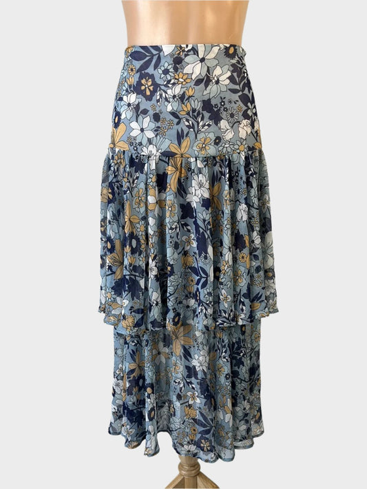 Ministry of Style layered skirt in sheer crepe with retro floral print in blue and white, featuring a yoke waist for smart casual.