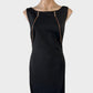 Portmans sleeveless bodycon dress in black jersey, featuring a bateau neck, front zips, and pencil skirt for evening.