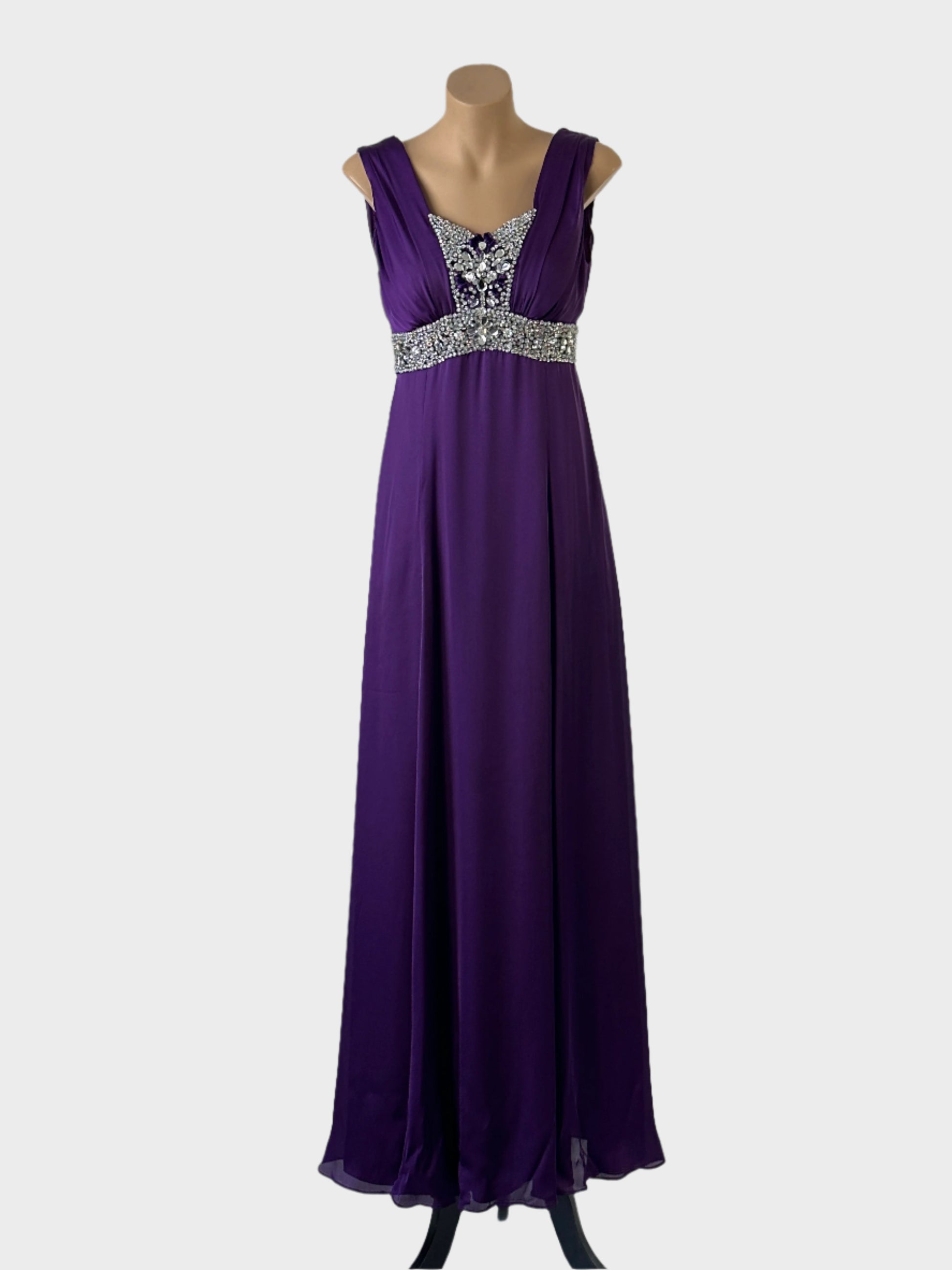 Empire waist gown in purple sheer mesh with diamante embellishments and wide gathered shoulder straps for formal occasions.