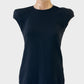 Scanlan Theodore black top with round neck, cap sleeves, and keyhole back for office or evening wear.