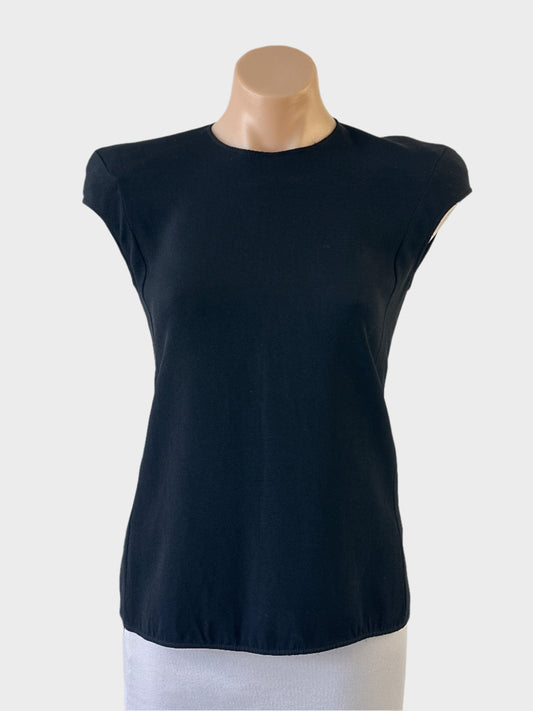 Scanlan Theodore black top with round neck, cap sleeves, and keyhole back for office or evening wear.