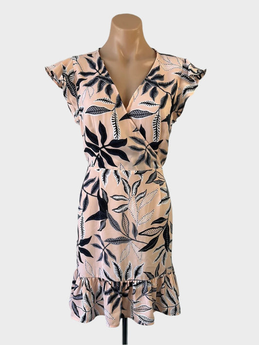 Tokito A-line dress in pink with botanical print, surplice neck, flutter cap sleeves, and flared skirt with ruffle hem for smart casual or office wear.