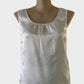 Trent Nathan white silk top with a puckered satin finish and sunburst neck for evening or special events.