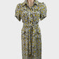Yellow vintage 90s shirt dress in crepe with bright post-modern pattern, button-up front, short sleeves, and tie waist sash for office wear.