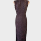 Vintage 60s cheongsam in brown silk jacquard with chrysanthemum pattern, asymmetric closure, and pencil skirt for evening.