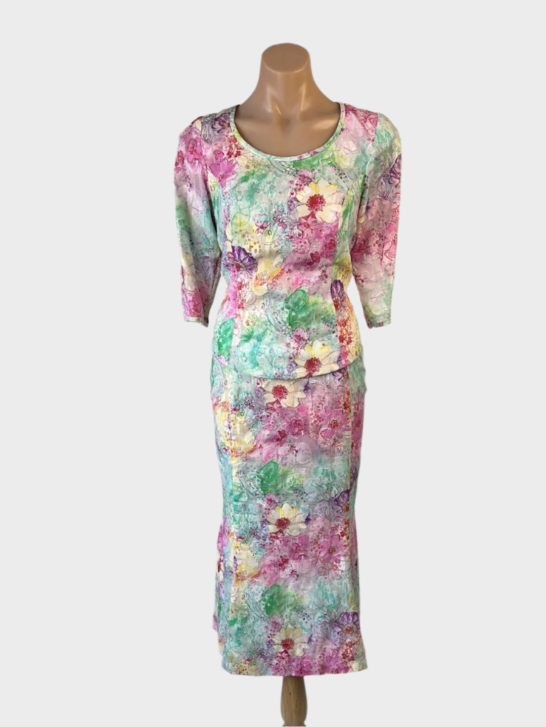 Vintage 80s skirt and top set in textured weave with watercolour floral print, scoop neck, flared skirt, and elbow length sleeves for special events.