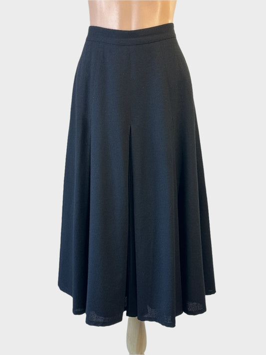 Designer Adam Bennett pleated skirt in black with regular waistband for office or smart casual wear.