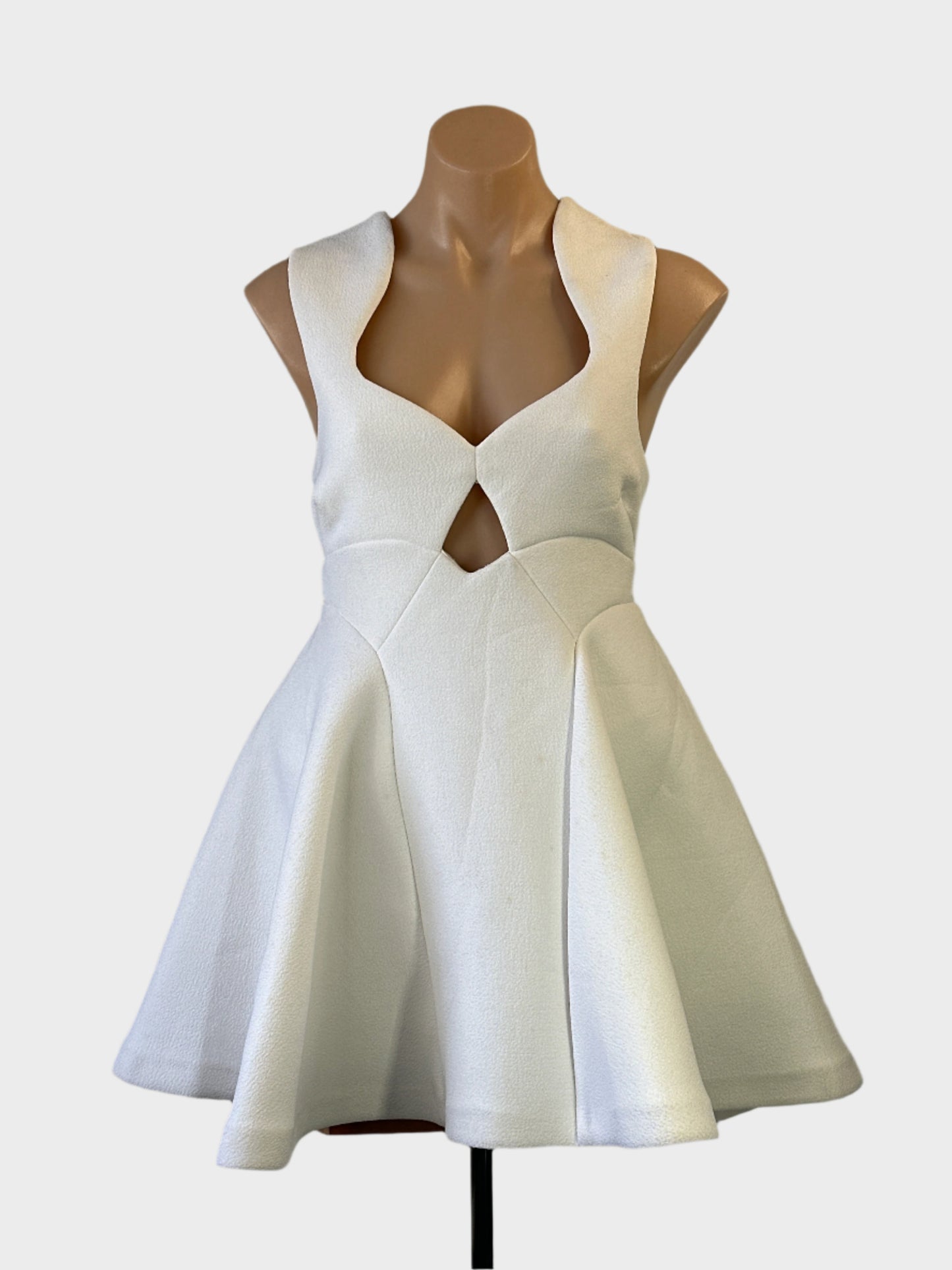 Designer Alice McCall A-line dress in white with sweetheart neck and skater skirt for formal or special events wear.