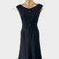Designer Ann Klein sleeveless A-line dress in black with keyhole neck, loop knot waistband and flared skirt for office or evening wear.