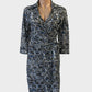 Ann Taylor dress in black white and cobalt blue pixel print with tie waist for office wear.