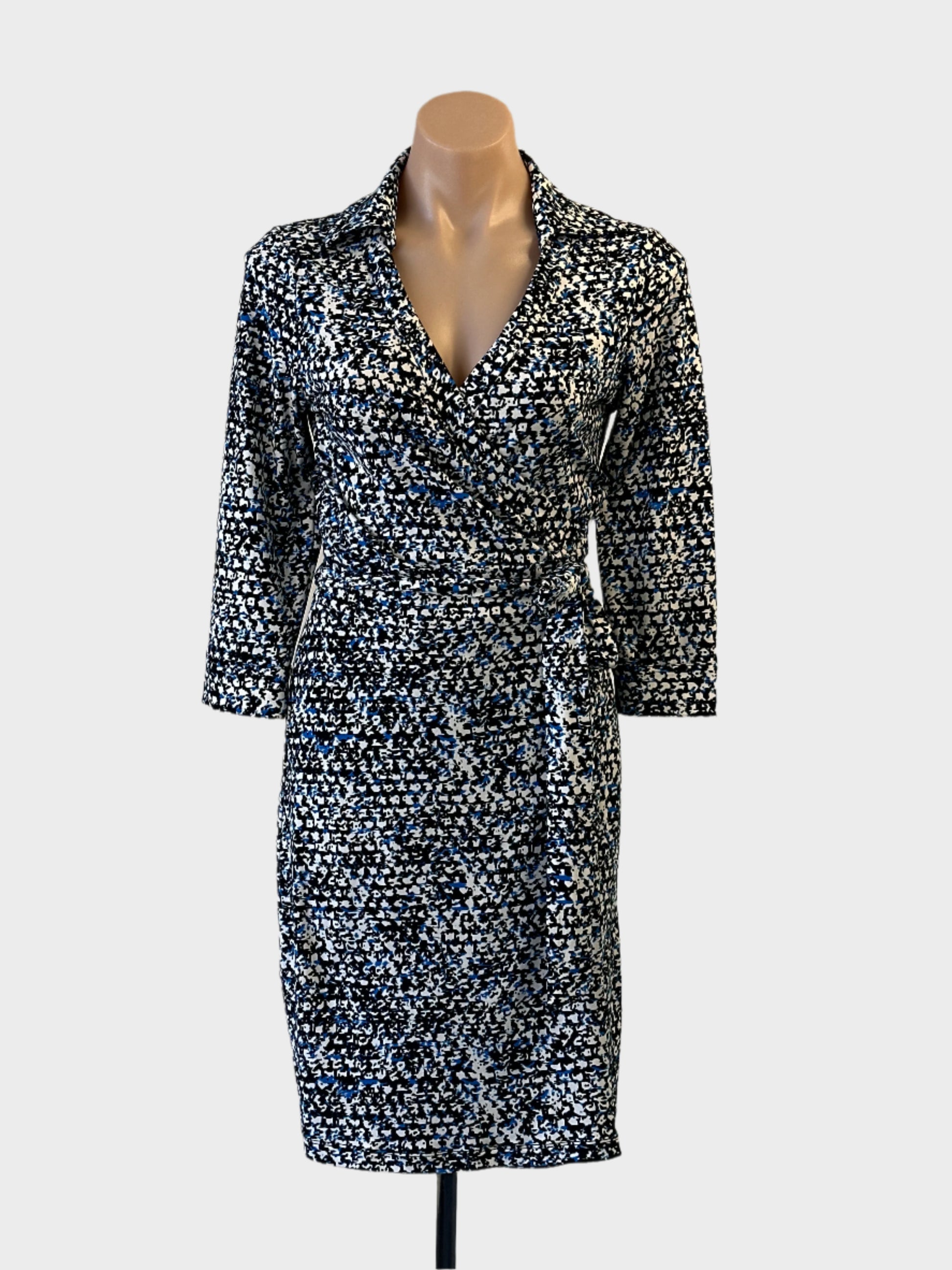 Ann Taylor dress in black white and cobalt blue pixel print with tie waist for office wear.