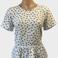 Designer Ann Taylor peplum top in grey and white georgette with wing motif, centre front seam, round neck, short sleeves and keyhole back for office.