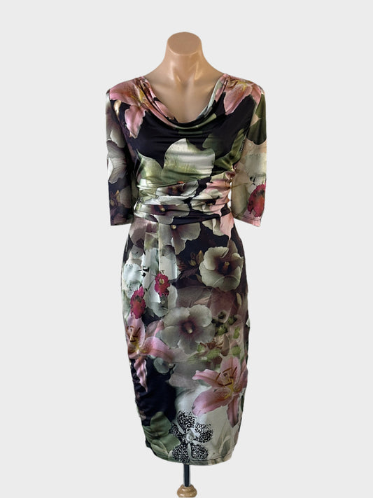 Designer Anthea Crawford sheath dress in multicoloured jersey with dark floral lilies print, elbow sleeves, cowl neck, ruched waist and pleated straight skirt for office or events.