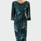 Designer Anthea Crawford sheath dress in black and green dot print with draped skirt for office or special events wear.