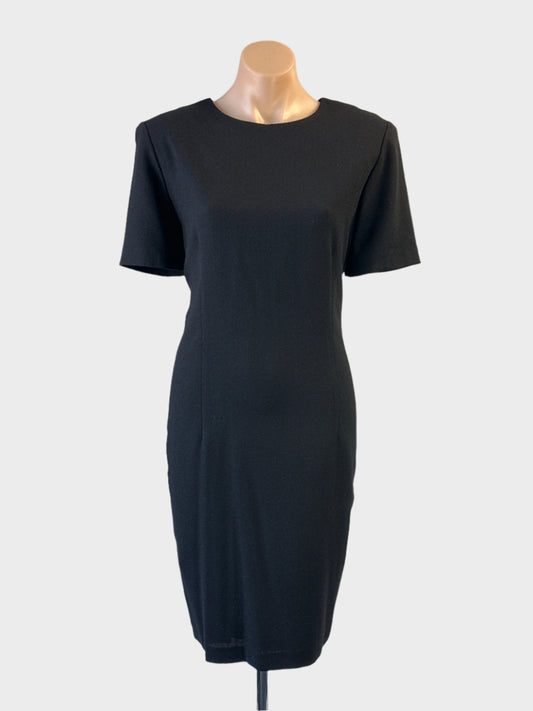 Designer Anthea Crawford shift dress in black with jewel neck and shoulder pads for office wear.