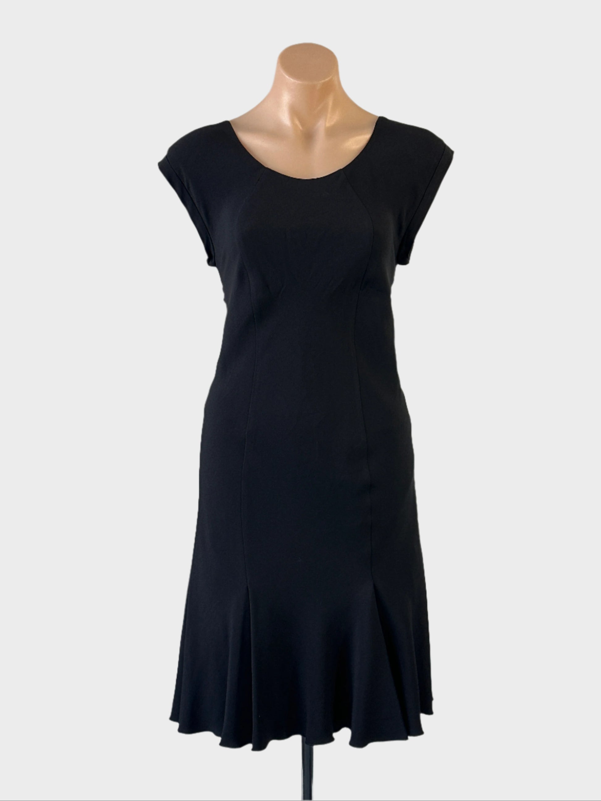 Designer Armani - Emporio shift dress in black crepe with round neck, v-shaped back and pleated front hem for office or evening wear.