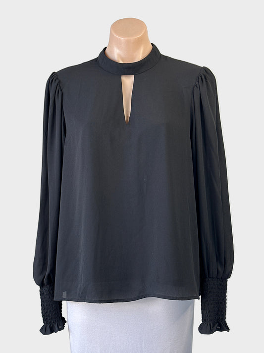 Atmos & Here blouse with keyhole front, narrow band collar tie, and frilled shirred cuffs for evening or office wear.