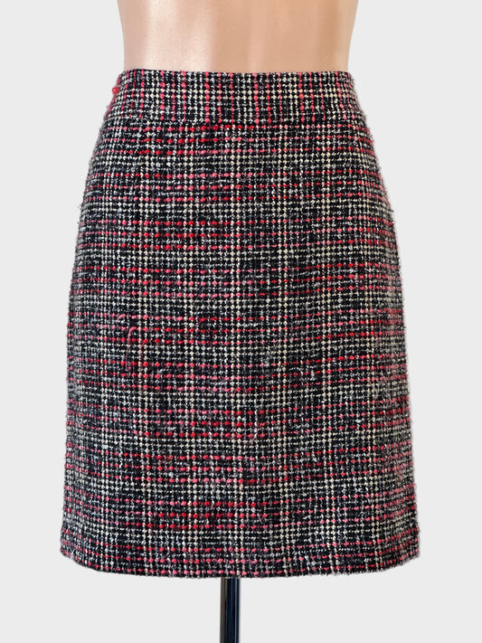 Designer Banana Republic black check straight skirt with standard waistband and back vent for smart casual or office wear.