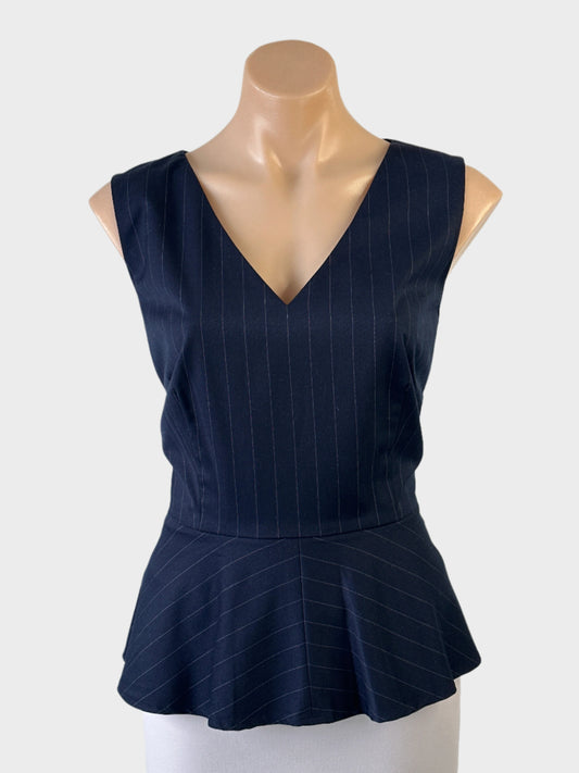 Basque blue sleeveless peplum top with opposing pin stripes and v-neck for office wear.