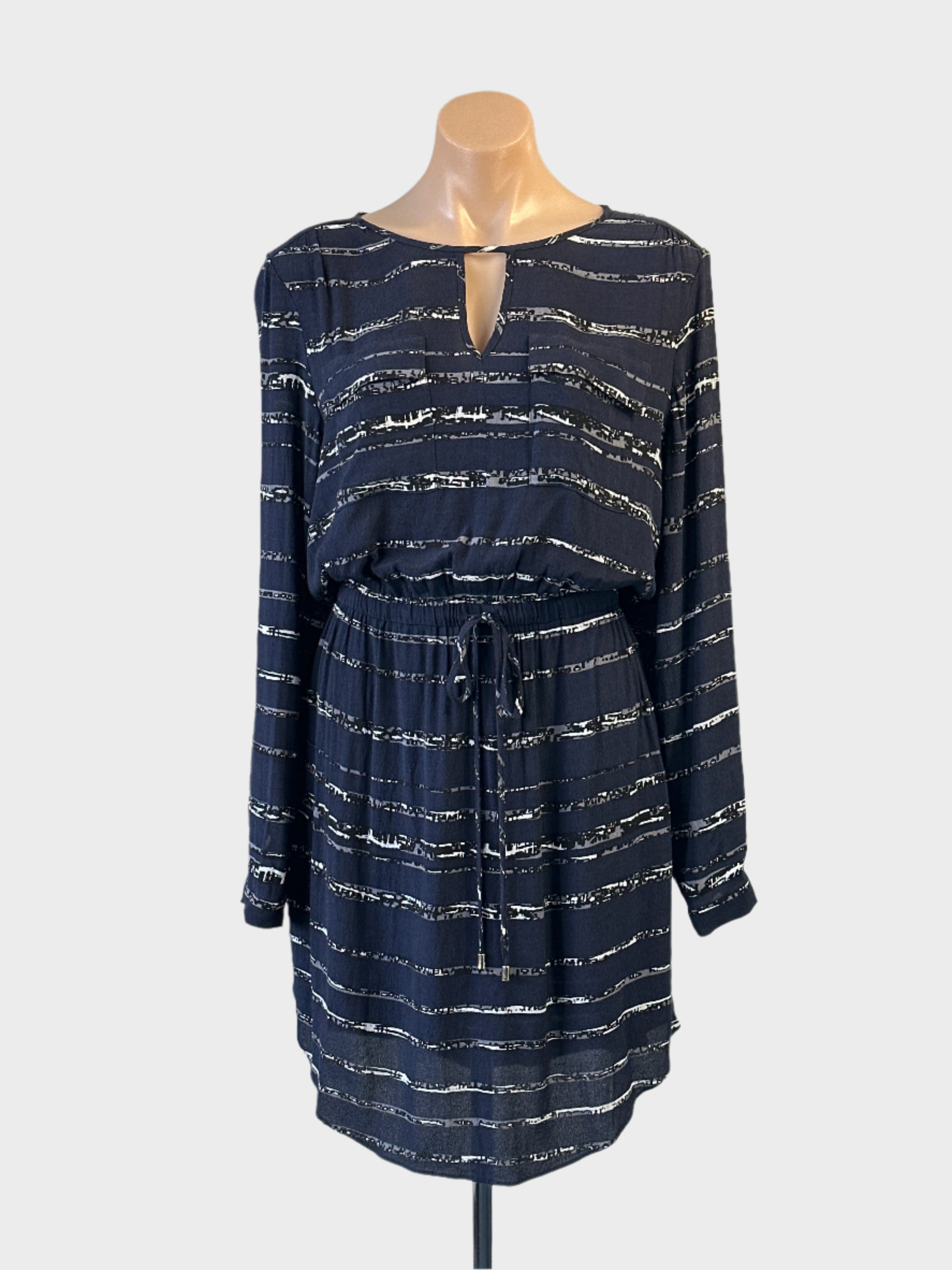 Basque knee length blouson dress in slate blue with stripe print, bar neck and drawstring waist for office or smart casual wear.