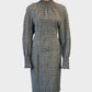 Designer bassike check dress in black and white with shirred cuffs and collar for office or special events wear.