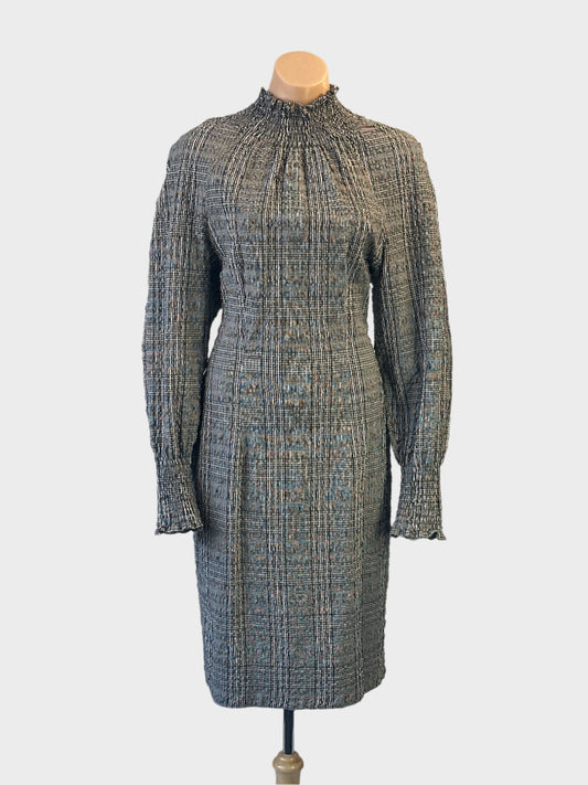 Designer bassike check dress in black and white with shirred cuffs and collar for office or special events wear.