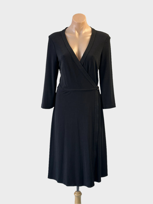 Designer BCBG Max Azria wrap dress in black with three quarter sleeves and buckle tie for office wear.