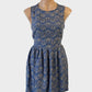 Bec + Bridge sleeveless A-line dress in blue and beige chevron stripe for smart casual or resort wear.