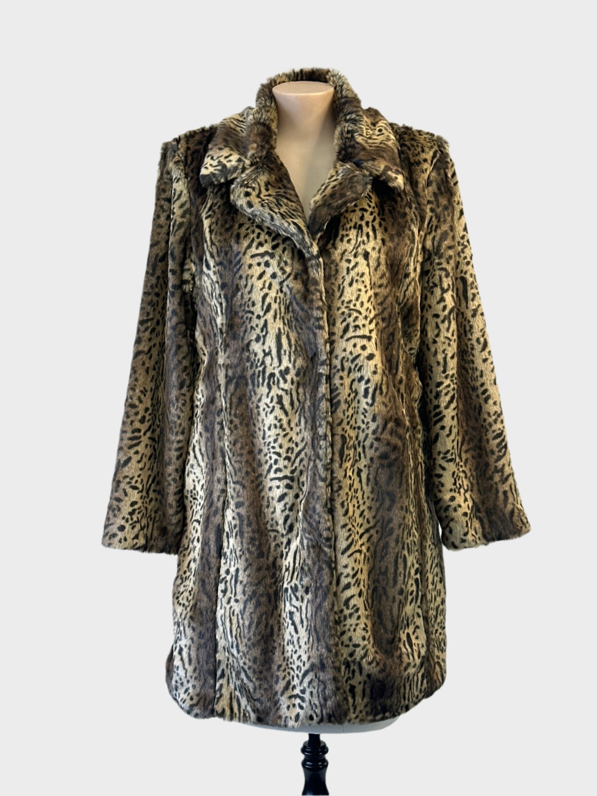 Bella Loren faux fur coat in leopard print with notched collar and in-seam pockets for evening or smart casual wear.
