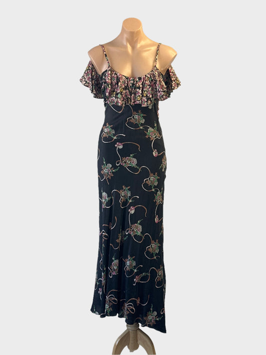 Designer Binny floral dress in black with flounce top and waist sash for evening or special events wear.