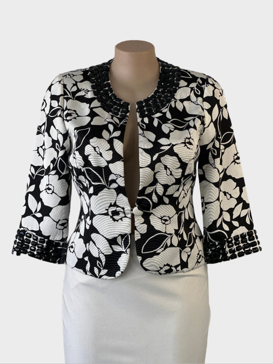 B-J-C single breasted cardigan jacket in black & white monochrome floral print with beaded trim and three quarter sleeves for office or special events.