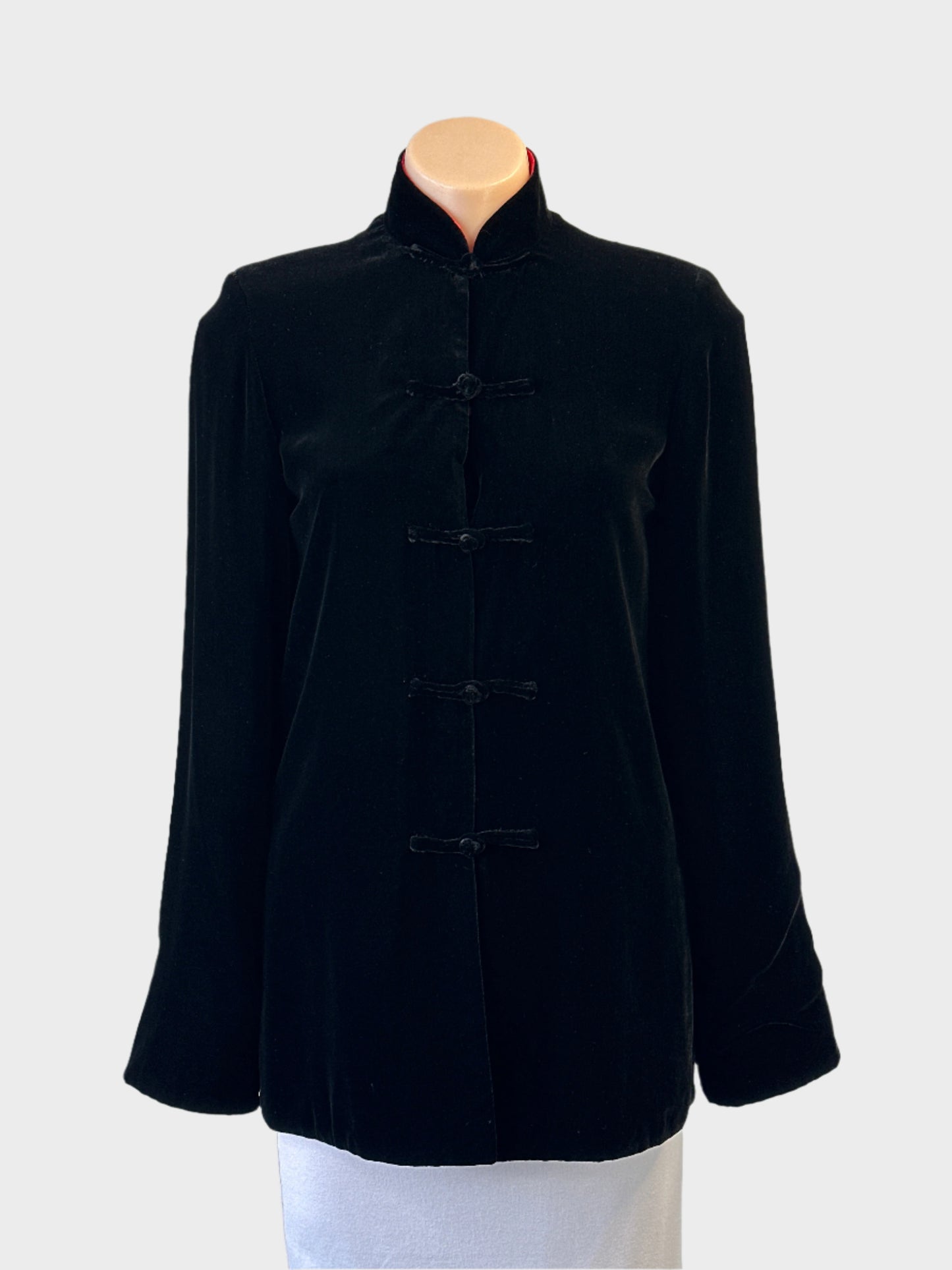 Black and red reversible velvet Mandarin jacket with silk jacquard lining and frog buttons for evening or formal wear.