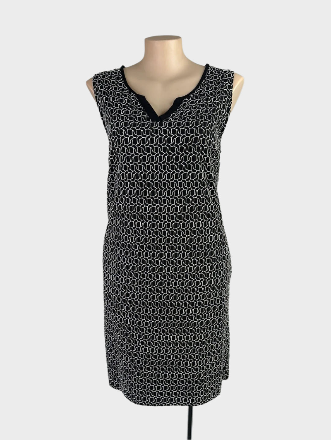 Blue Illusion black and white sleeveless shift dress with embroidered chain pattern and notched neck for smart casual or office wear.