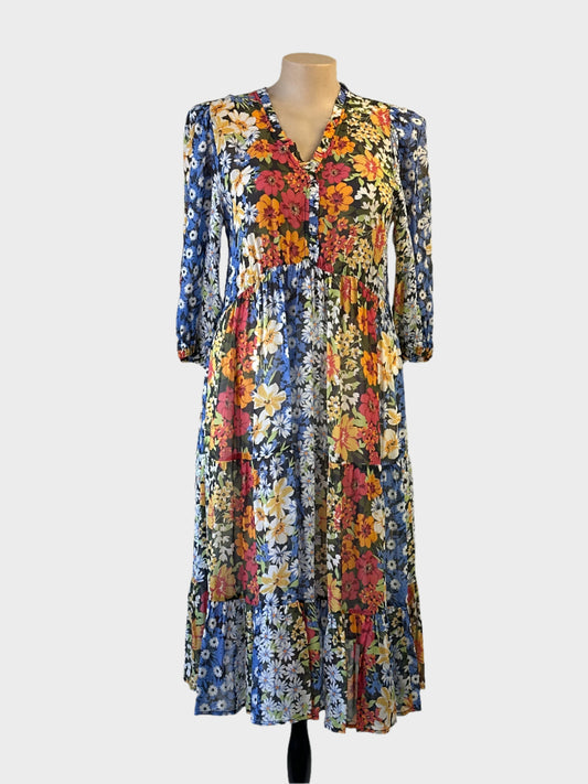 Blue Illusion smock dress in black with floral patchwork print and frill trim for smart casual or resort wear.