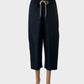 Designer Byfreer straight leg cropped pants in blue cotton canvas with high-rise elasticated waist and frayed cuffs for smart casual or resort wear.