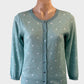 Designer B.yu cardigan in green and white with metallic flecks and button front for office or special events wear.