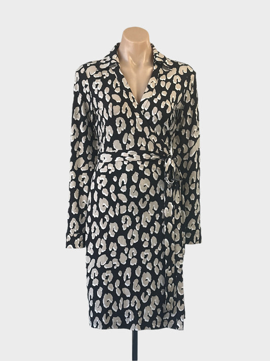 Designer Calvin Klein black jersey wrap dress with abstract leopard print, johnny collar, long sleeves and waist tie for office wear