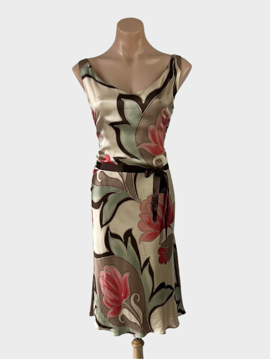 Designer Coast beige and pink bias cut A-line dress with floral print, satin finish, and waist sash for special events or evening wear.